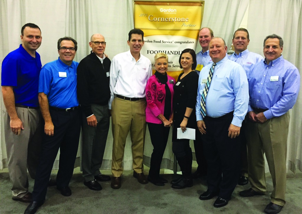 The FoodHandler management and sales teams receive a 2015 U.S. Cornerstone Partner Award from Gordon Food Service at the company’s Vendor Involvement Process supplier awards on Oct. 5 in Grand Rapids, Mich.